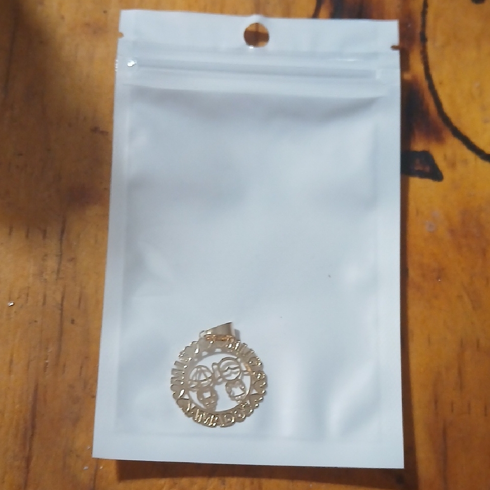 Gold Pendant with Intricate Design